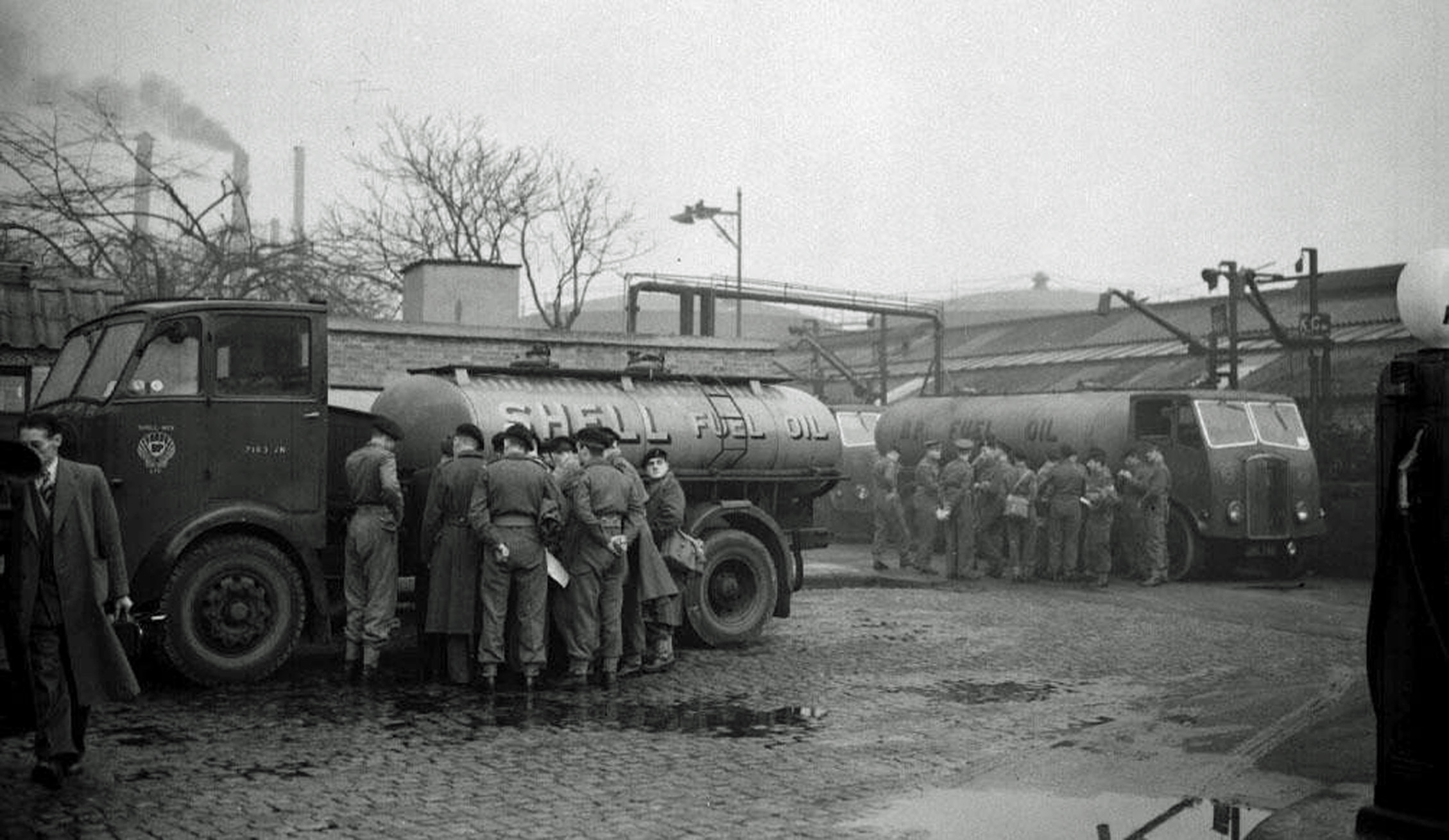 Soldiers being shown the operation of tankers at the St. Leonards Wharf heavy oil depot in Poplar, east London, as 800 Army drivers went into action at storage centres to restore the distribution of petrol and oil, interrupted by the strike of civilian