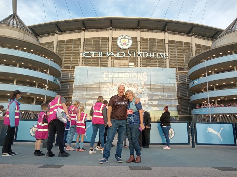 Stephen Burnett and Chris Driver outside of the Etihad Stadium in their Wycombe shirts 