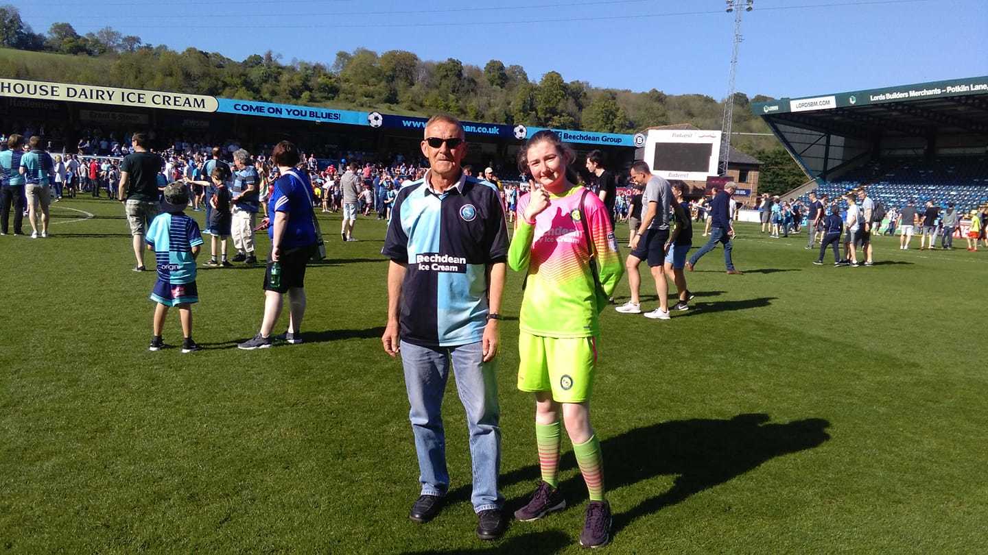 Fans donning their kits on the Adams Park pitch 
