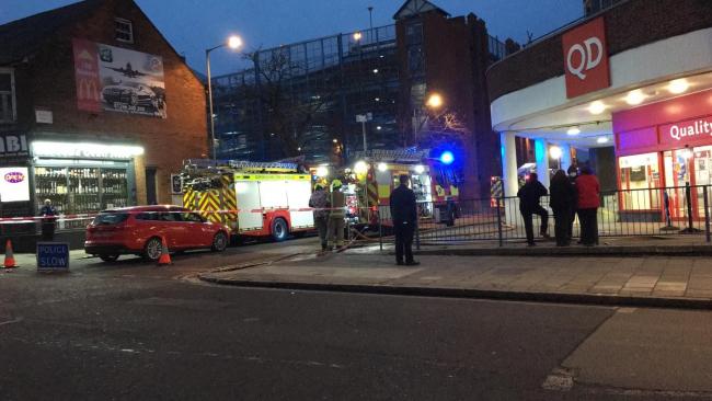 Staff evacuated after reports of fire above shop