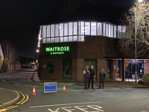 Bucks Free Press: Workers, security and police stood outside the supermarket whilst police handled the incident
