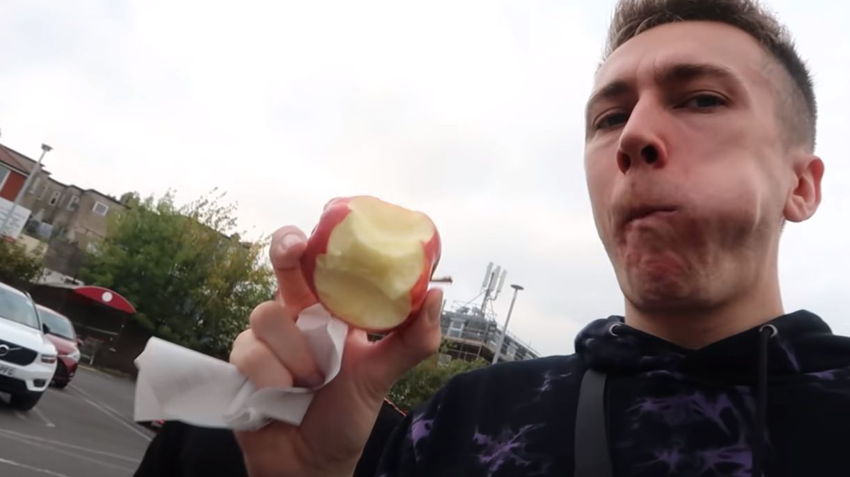 Minter completes on the tasks by eating an apple 