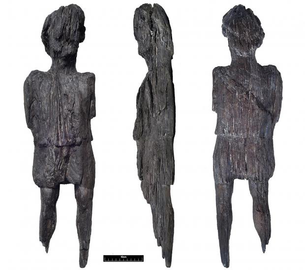 Bucks Free Press: Roman wooden carved figure which has been discovered in a waterlogged ditch during work on the HS2 project. Credit: HS2/PA