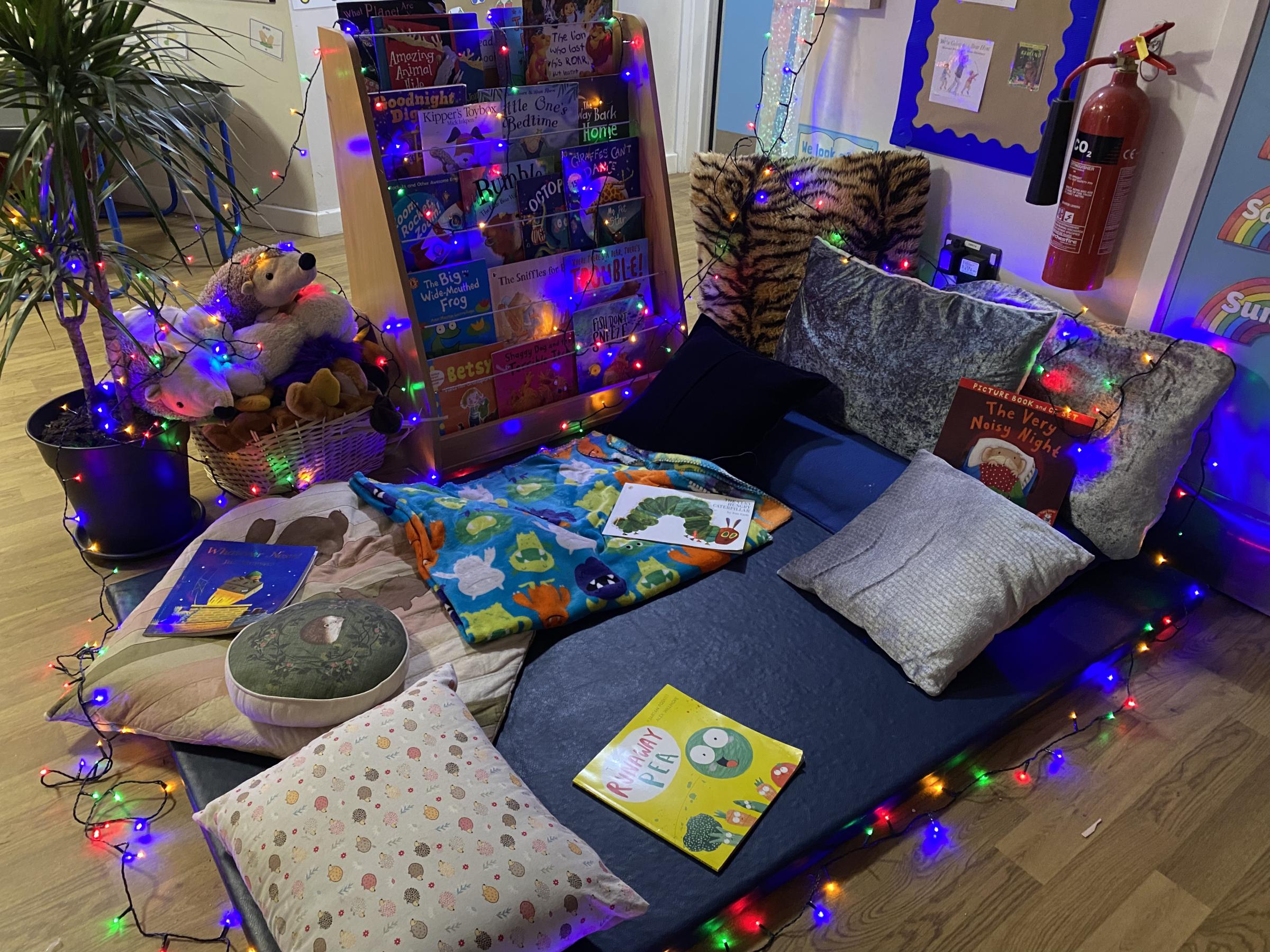 Bucks Free Press: 90 parents attended a presentation about reading and then visited beautifully set up classrooms to relax and immerse their children in the joy of books.