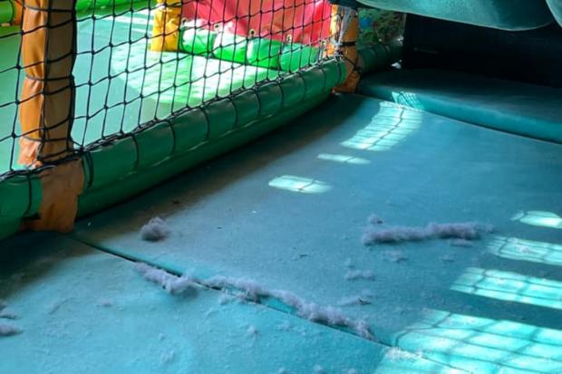Bucks Free Press: Rolls of dust on the floor of the toddler play area. 