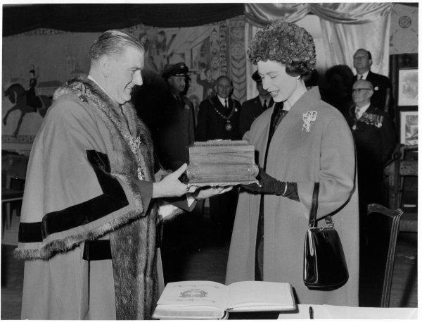 The Mayor presents Queen Elizabeth II with a Casket as a memento of her visit. Queen Victoria Road, High Wycombe. April 1962