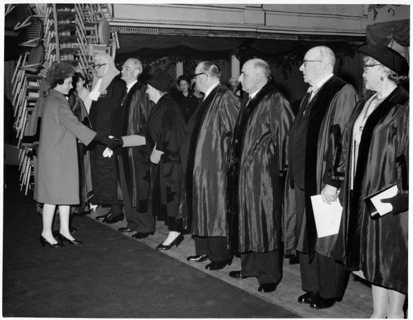 Queen Elizabeth II meets senior Town Councillors at the Town Hall, Queen Victoria Road, High Wycombe. April 1962