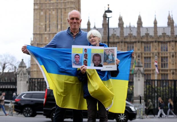 Bucks Free Press: Trevor and Debbie Farnfield at the protest outside the Houses of Parliament (PA Media)