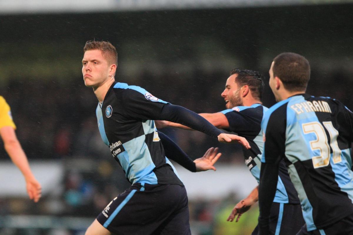 Alfie Mawson spent the 2014/15 season with Wycombe, scoring seven goals in 50 matches (PA)
