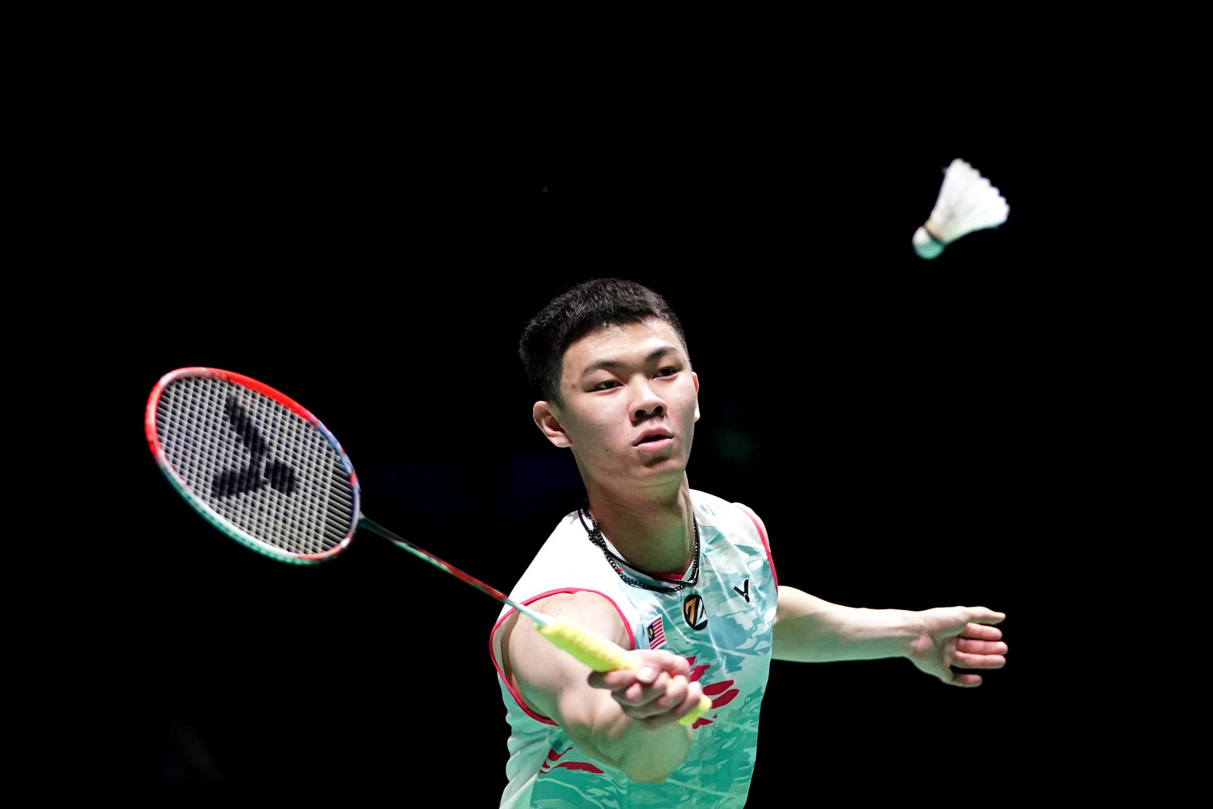 Malaysias Lee Zii Jia in action against Japans Kenta Nishimoto during day one of the YONEX All England Open Badminton Championships at the Utilita Arena Birmingham. He was due to play at this years games but dropped out (PA)