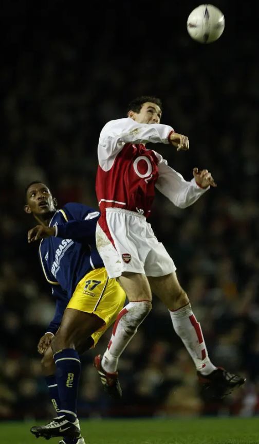 Jefferson Louis playing for Oxford United against Arsenal in an FA Cup match in 2003. Oxford would lose 2-0 (PA)
