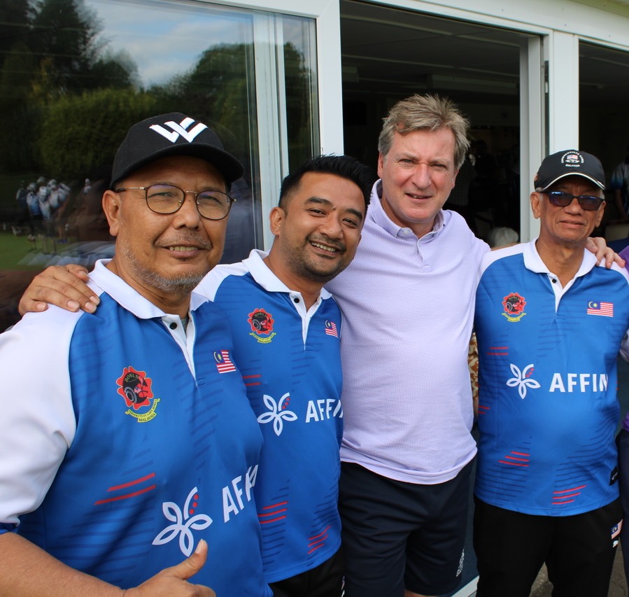 John McGuinness (third right) with three members of the Malaysian team (Gerrards Cross Bowls Club)