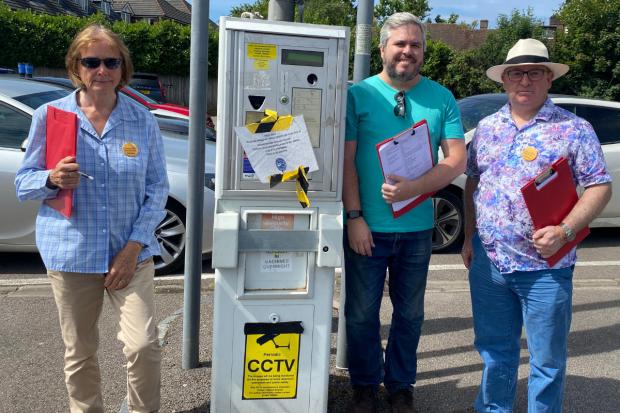 Bucks Free Press: Councillors Rachel Dineley, Dominic Pinkney and Mark Roberts at one of the Sycamore Road payment machines (Mark Roberts)