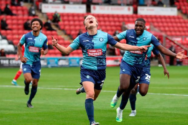 Alex Samuel (pictured against Fleetwood in 2020) has opened up on his time at Wycombe