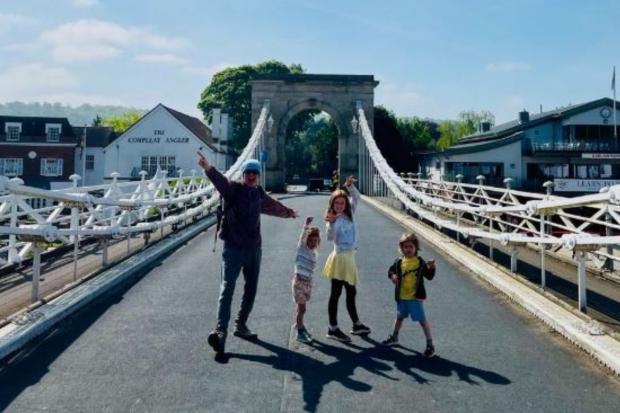 Chris Evans with his family on Marlow bridge