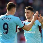 Sam Vokes (left) and Robbie Brady (right) playing for Burnley against Middlesbrough in April 2017 in the Premier League (PA)