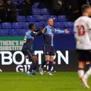 Jack Grimmer celebrates scoring his first goal for Wycombe in his 84th match for the club (PA)