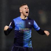 Jason McCarthy (pictured celebrating his last-minute winner for Wycombe against Fleetwood in March 2022), spoke to the Free Press about his faith
