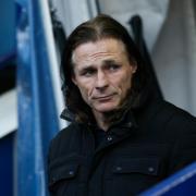 Gareth Ainsworth's side will take on Peterborough United this weekend, in what will be the first meeting between the two at Adams Park in three years (PA)