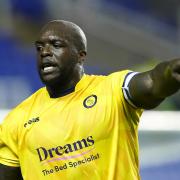Adebayo Akinfenwa (pictured against Reading in 2020) scored Wycombe's goal late against AFC Wimbledon (PA)