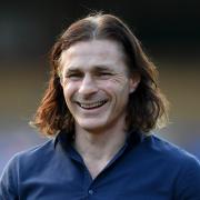 Gareth Ainsworth was all smiles as Wycombe defeated Burton 3-0 on the opening weekend of the season (PA)