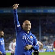 Sunderland manager Alex Neil salutes the fans after reaching the League One play-off final (PA)