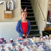 Lola, the nine-year-old owner of Lola's Wicks candle-makers.