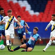 Wycombe Wanderers' 2-1 win over Oxford United in July 2020 secured the club their place in the Championship for the first time (PA)