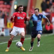 Josh Scowen (pictured against Charlton Athletic in 2022) played the final 20 minutes in Wycombe's 2-1 loss away at Burton on March 10