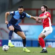 Ryan Tafazolli (pictured against Morecambe in the 2021/22 season), scored his first goal of the season in Wycombe's 3-0 win away at Peterborough