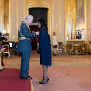 Youth sports champion receives MBE from King Charles