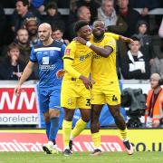 Deji Oshilaja (pictured right in November 2022) was sent off in Burton's 2-1 win over Wycombe on March 10 for a rash tackle on Lewis Wing