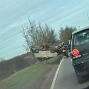 The vehicle was on its rooftop in the morning of Saturday, March 11 along the A41