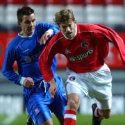 Charlton Athletic's Jesper Blomqvist battles with Ipswich Town's Matt Bloomfield in a Premier Reserve League match in December 2002 at the Valley