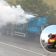 Firefighters tackle blaze for hours after car batteries catch fire