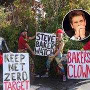 Campaign group hold 'clown vigil' in protest of Steve Baker's climate change 'denial'