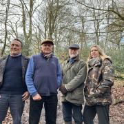 The campaigners are hoping to save the woodland area in Lane End