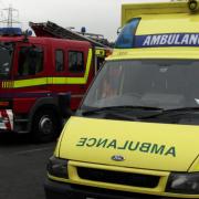 Ambulance treats man after Christmas tree lights catch fire
