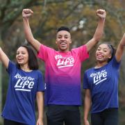 Cancer survivor Crystal Manuel (centre) with children Cameron, 15, (left) and Chaia, 13, (right) will Race for Life