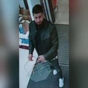 Police release CCTV footage after alcohol robbery leaves shop staff injured