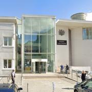 Woman 'heard mother plunge knife into husband's back' over the phone, court hears