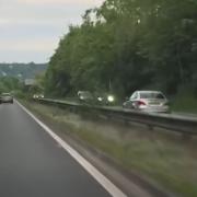 Car driving wrong side of A404