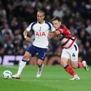 Tottenham Hotspur's Xavi Simons (left) and Doncaster Rovers Owen Bailey (right) battle for the ball during the Carabao Cup third round match at the Tottenham Hotspur Stadium, London. Picture date: Wednesday September 24, 2025. PA Photo. Photo credit