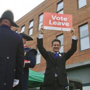 MP Steve Baker takes to the stage with his Vote Leave banner
