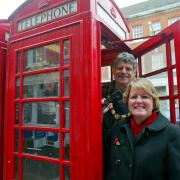Cllr Brown with Mayor Neil Marshall when the red phone boxes were saved