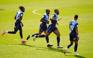 Uche Ikpeazu (pictured second right after scoring for Wycombe Wanderers against Bournemouth in May 2021) could re-join the club