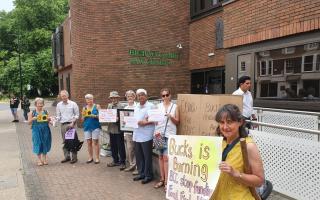 The campaigners called for Bucks Council to stop funding fossil fuels.