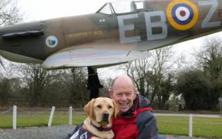 RAF thrift shop raises £5k for veteran support dog charity