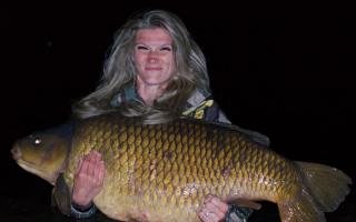 Woman catches record-breaking 'giant' carp at Bucks fishery