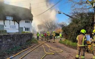 Police road closure after 'huge' house fire in Bucks